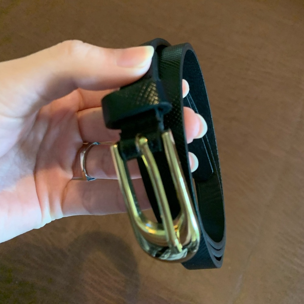 Women’s black belt with gold buckle